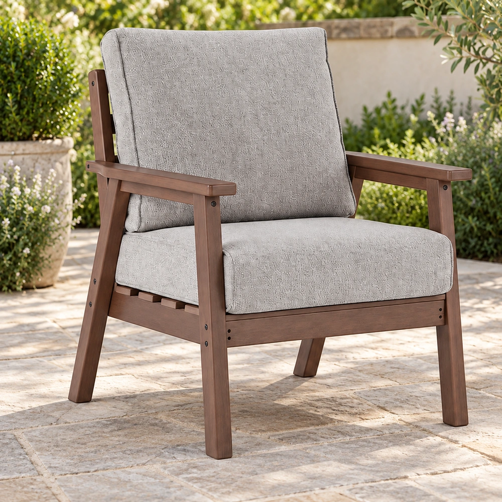 Front-left view of brown cushioned HDPE outdoor lounge armchair on a sheltered garden patio