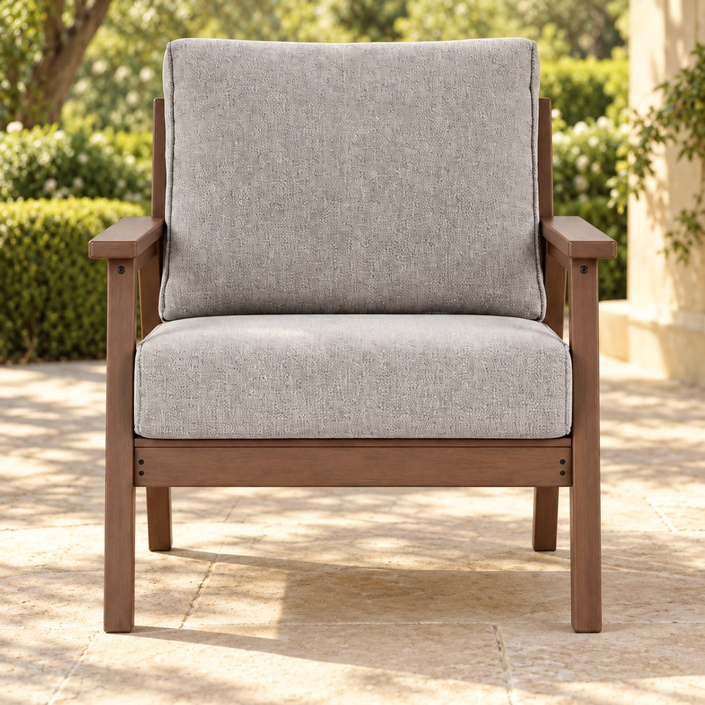 True front view of brown cushioned HDPE outdoor lounge armchair on a sheltered garden patio