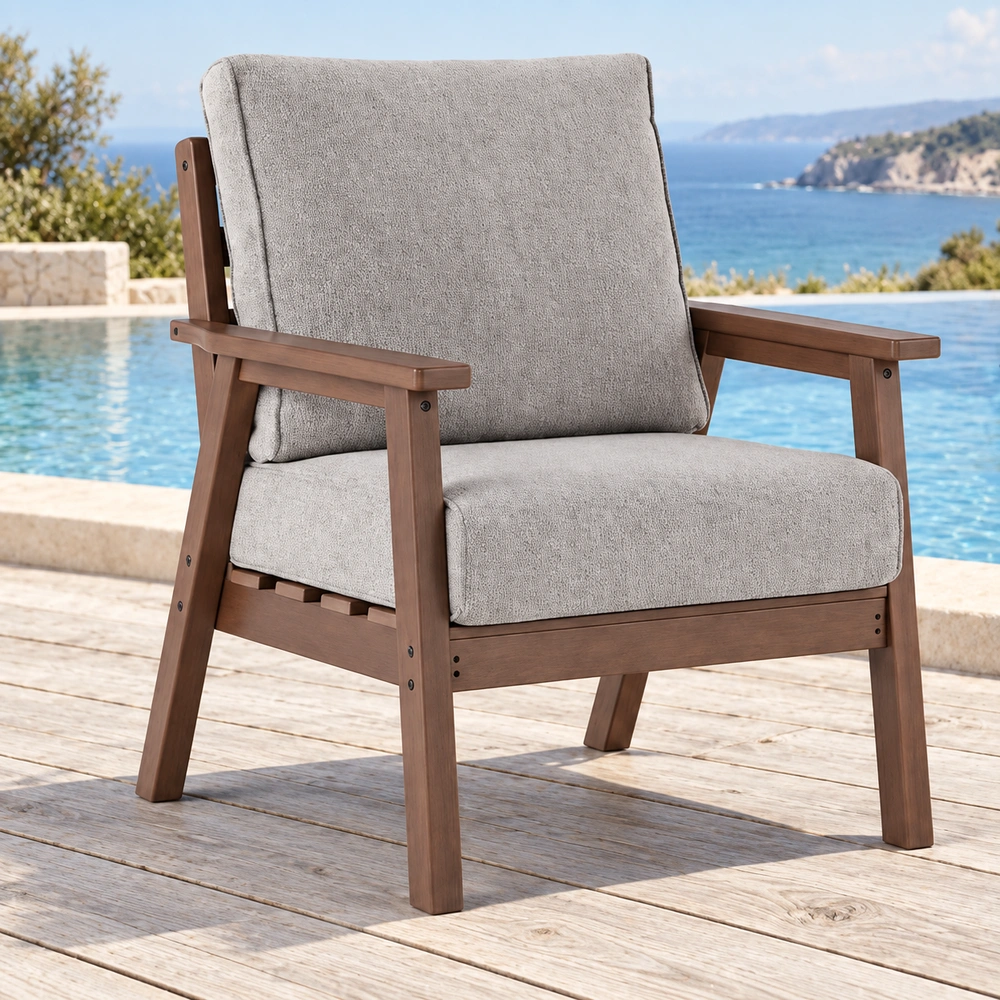 Front-left view of the brown HDPE outdoor lounge chair with two gray cushions on a dry timber pool terrace