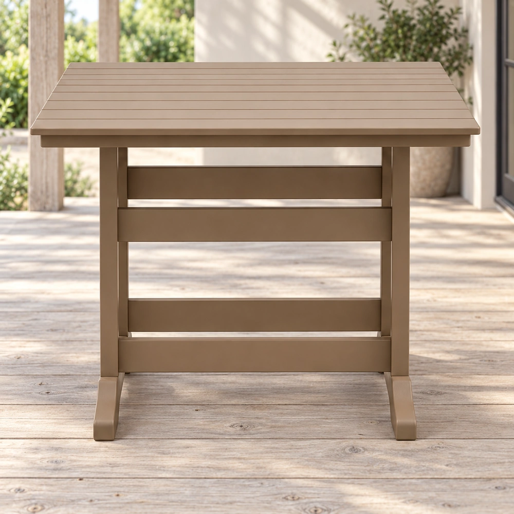 Front view of the taupe square trestle-base HDPE dining table on a covered timber veranda