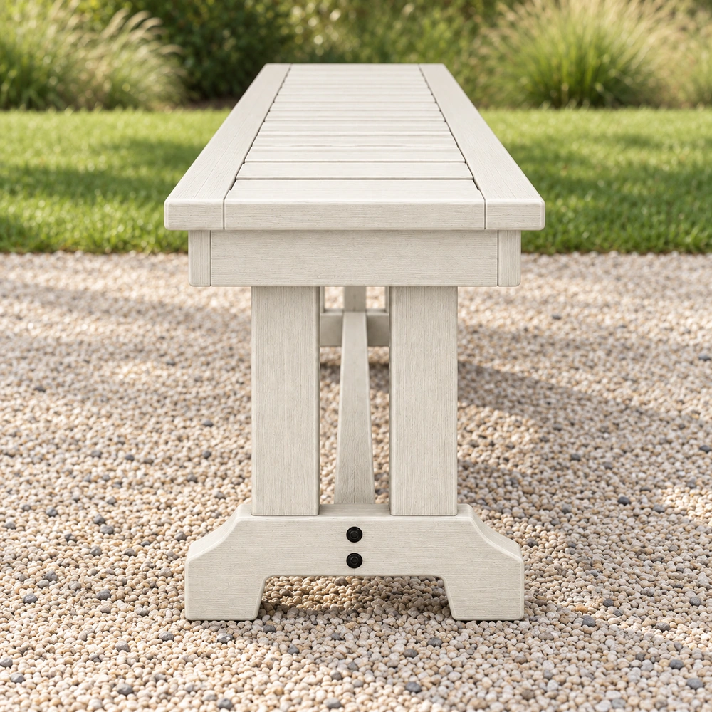 True end view beside a lawn of the HDPE backless outdoor dining bench