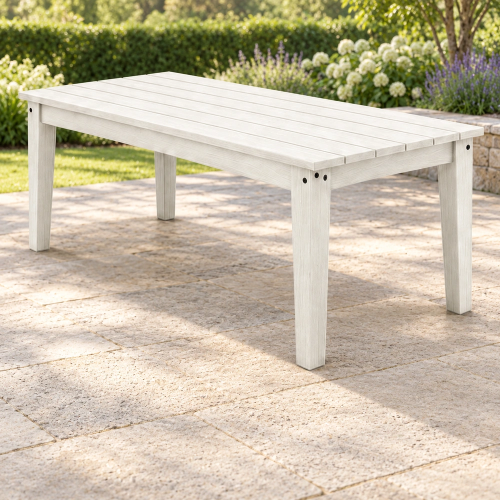 Front-right view on an open garden patio of the white HDPE outdoor dining table